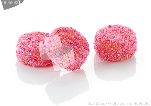 Image of pink candies on white background