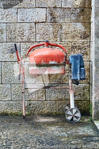 Image of Concrete mixer in a backyard