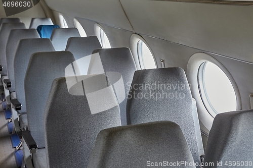 Image of Airliner interior old seats