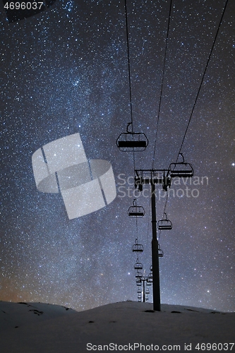 Image of Ski lift at night under the stars in the sky