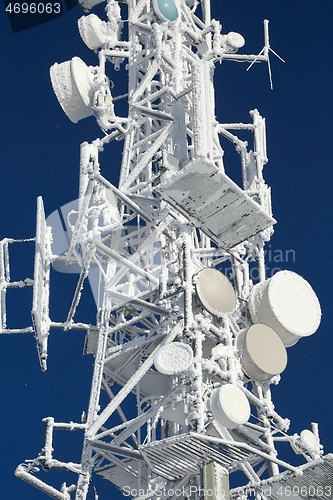 Image of Transmitter tower frozen in winter frost