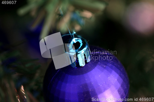 Image of Christmas ornaments on tree.