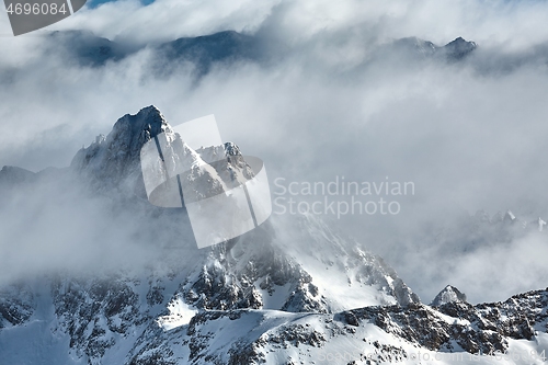 Image of High mountains in clouds