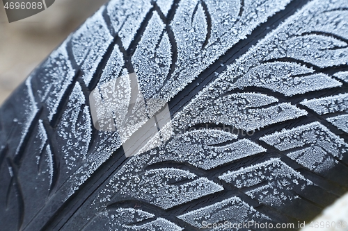 Image of Abandoned Car Tyre in winter