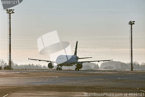 Image of Plane parked at an airport