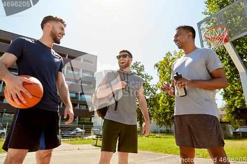 Image of group of male friends going to play basketball