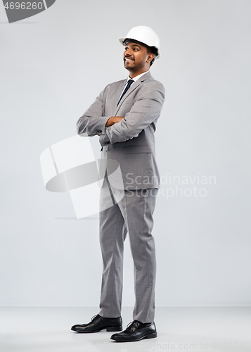 Image of indian male architect in helmet over grey