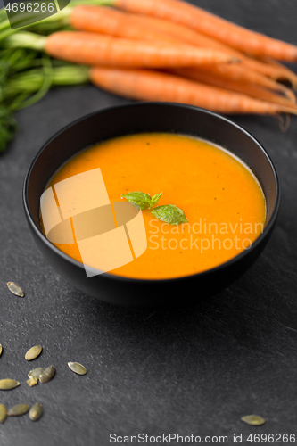 Image of close up of pumpkin cream soup and vegetables