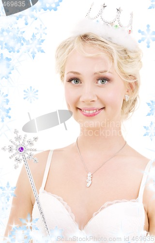 Image of lovely fairy in crown with magic wand