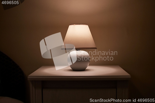 Image of Lamp on a nightstand