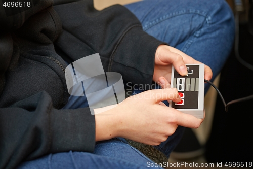 Image of Playing an old gaming console