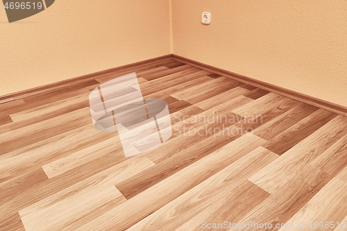Image of Parquet floor interior empty room corner