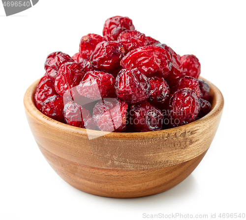 Image of dried cranberries in wooden bowl