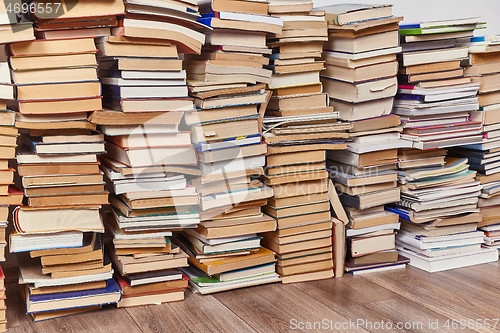 Image of Wall of books piled up