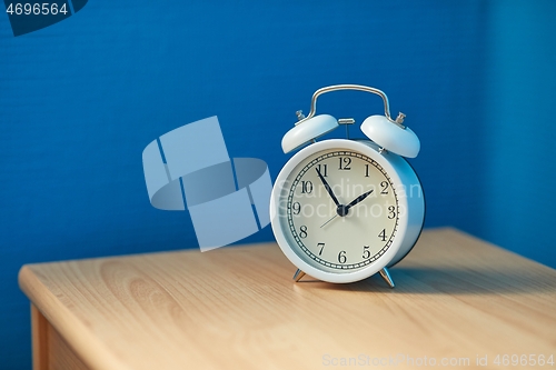 Image of Alarm Clock on a Shelf