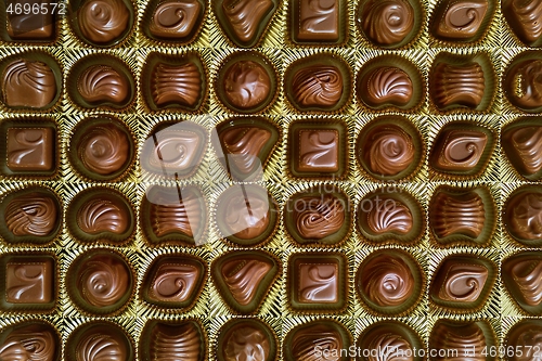 Image of Open box of chocolate treets