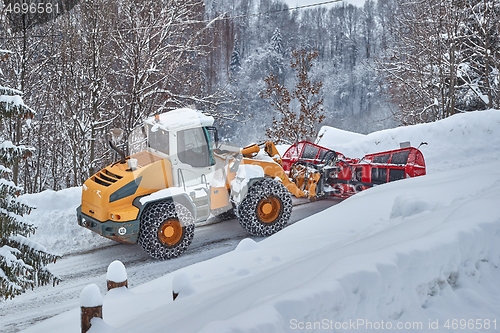 Image of Winter road clearing snowplow