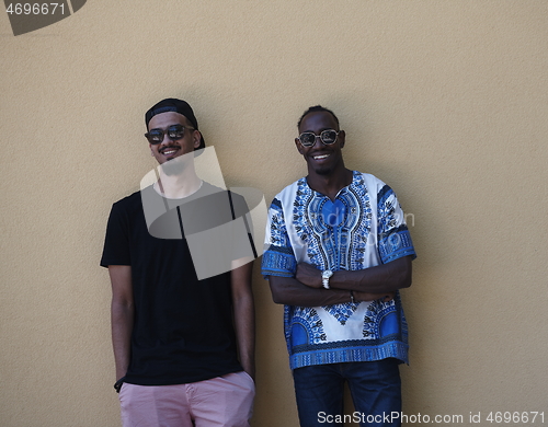 Image of middle eastern and black african frinends
