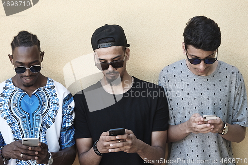 Image of multiethnic startup business people group using smart phones