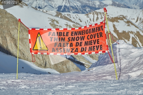 Image of Ski warning sign for lack of snow