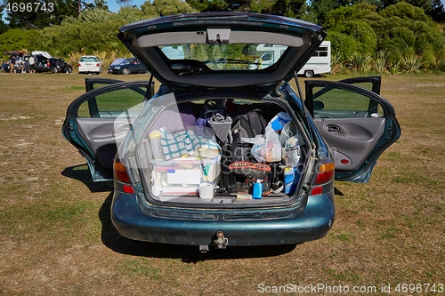 Image of Car trunk with stuff for camping