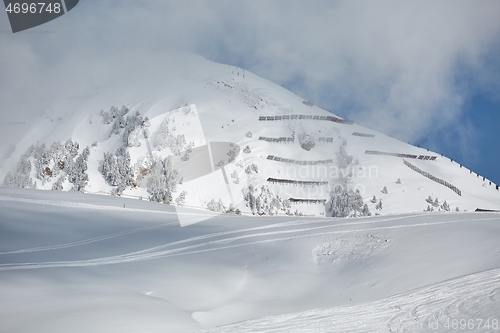 Image of Mountain Slope With Avalanch Barrier Railing