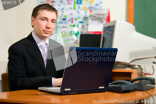 Image of Men with laptop