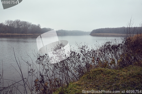 Image of Misty autumn river landscape