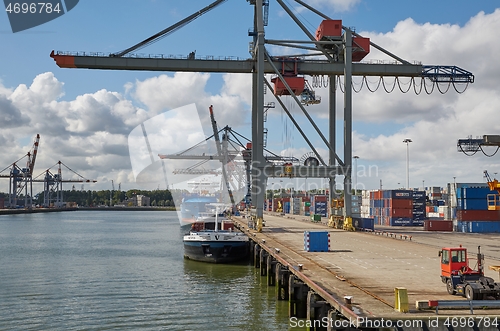 Image of Loading containers on a ship