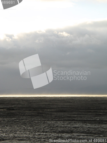 Image of strip of sun on the ocean