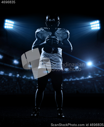 Image of portrait of confident American football player