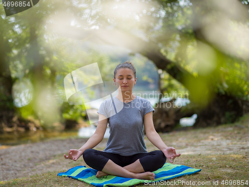 Image of woman meditating and doing yoga exercise