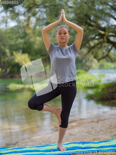 Image of woman meditating and doing yoga exercise