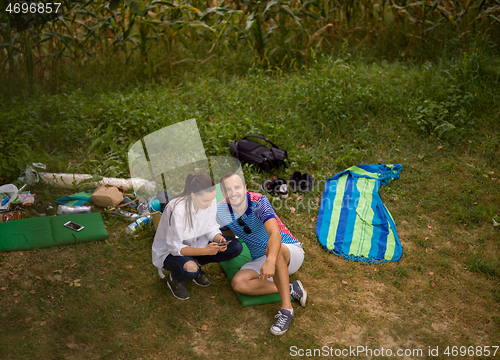 Image of Couple in love enjoying picnic time