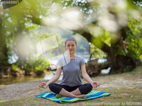 Image of woman meditating and doing yoga exercise