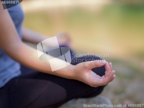 Image of woman meditating and doing yoga exercise