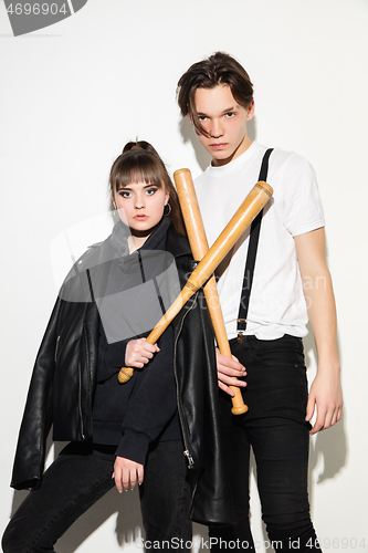 Image of Close up fashion portrait of two young pretty hipster teens
