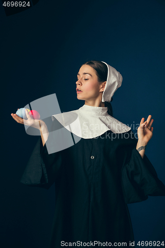 Image of Medieval young woman as a nun