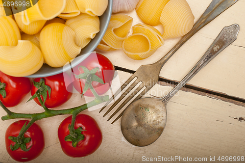 Image of Italian snail lumaconi pasta with tomatoes