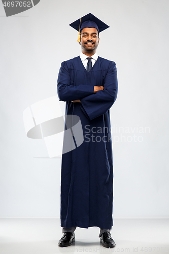 Image of graduate student in mortar board and bachelor gown