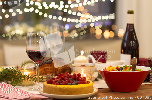 Image of food and drinks on christmas table at home