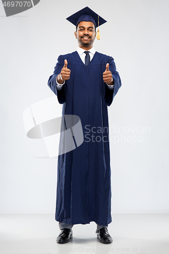 Image of indian male graduate student showing thumbs up