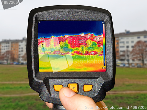 Image of Recording Heat Loss at the Residential building, With Thermal Ca