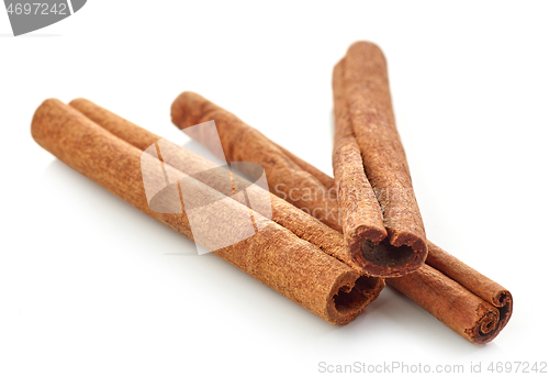 Image of cinnamon sticks on white background