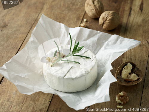 Image of fresh brie cheese and walnuts