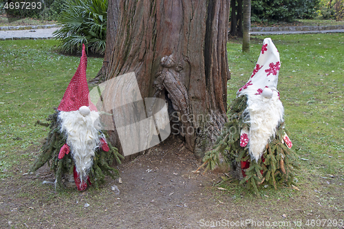 Image of Small garden dwarfs made of pine twigs as a Christmas decoration