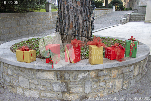 Image of Christmas decorations with Christmas gift boxes in a city park