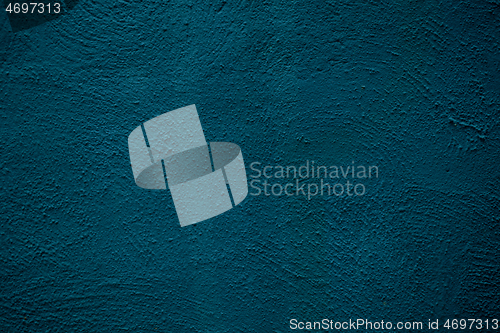 Image of Rough textured painted blue wall background