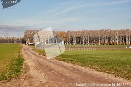 Image of Agircutural field with dirt road