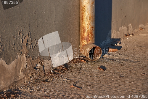 Image of Gutter pipe on a street